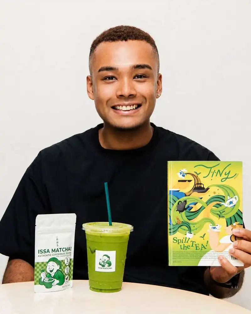 Alexis Junpei Sato with the retail pouch and The Tiny Issue magazine